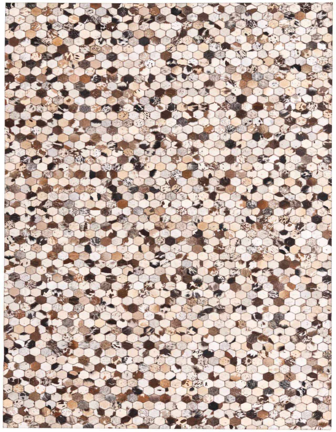 A rectangular 5x8 modern cowhide rug featuring a multi-colored hexagonal patchwork pattern in various natural brown, black, and white tones.