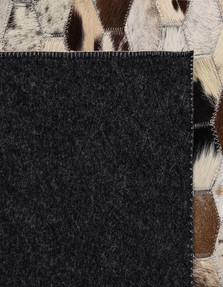 Detail image of  5' 1 x 7' 10 Cowhide Rug