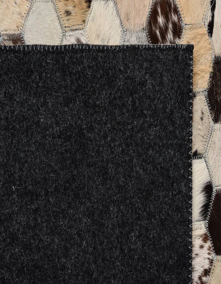 Detail image of  5' 2 x 8' Cowhide Rug