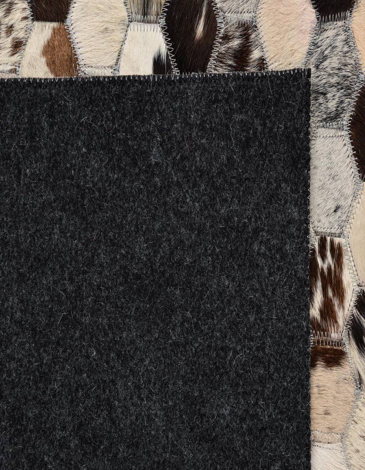 Detail image of  5' 1 x 7' 10 Cowhide Rug