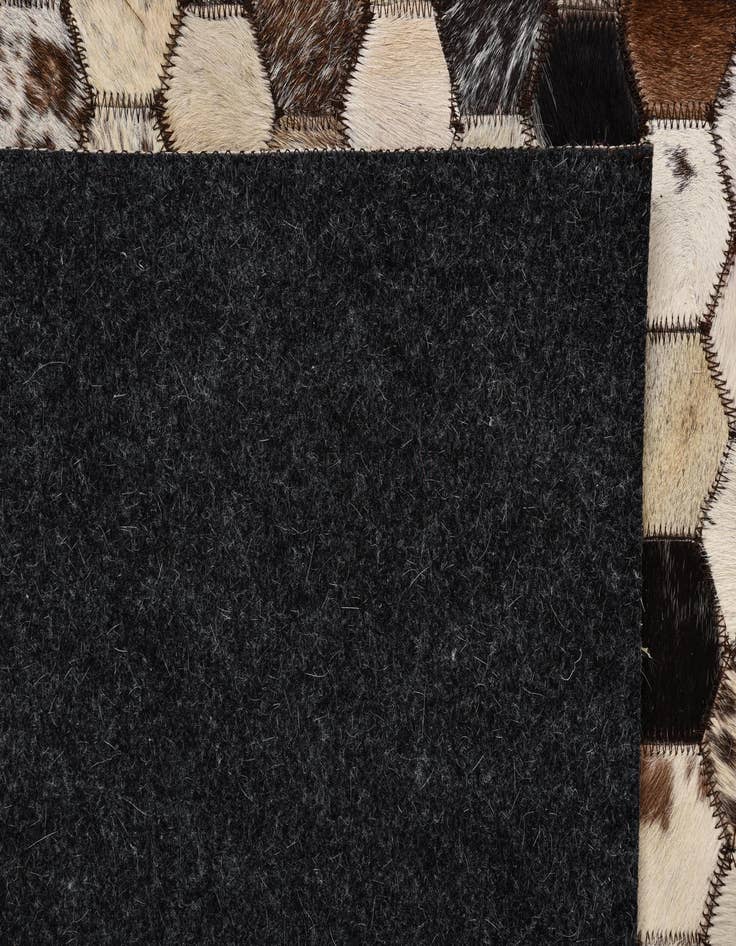 Detail image of  5' 1 x 8' 2 Cowhide Rug