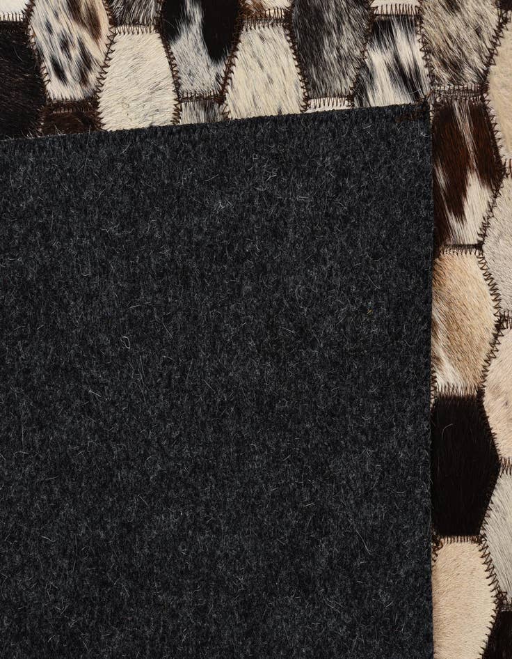 Detail image of  5' 1 x 8' 1 Cowhide Rug