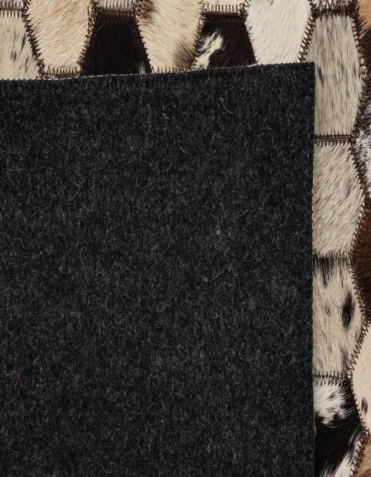 Detail image of  5' 1 x 8' 2 Cowhide Rug