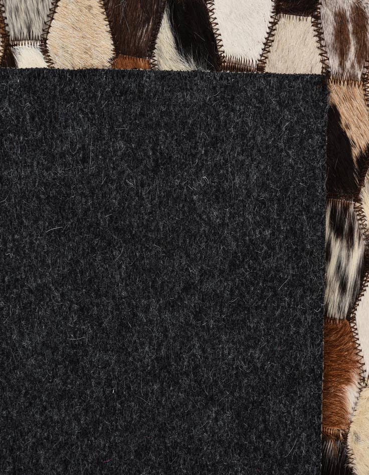 Detail image of  5' 2 x 8' 2 Cowhide Rug