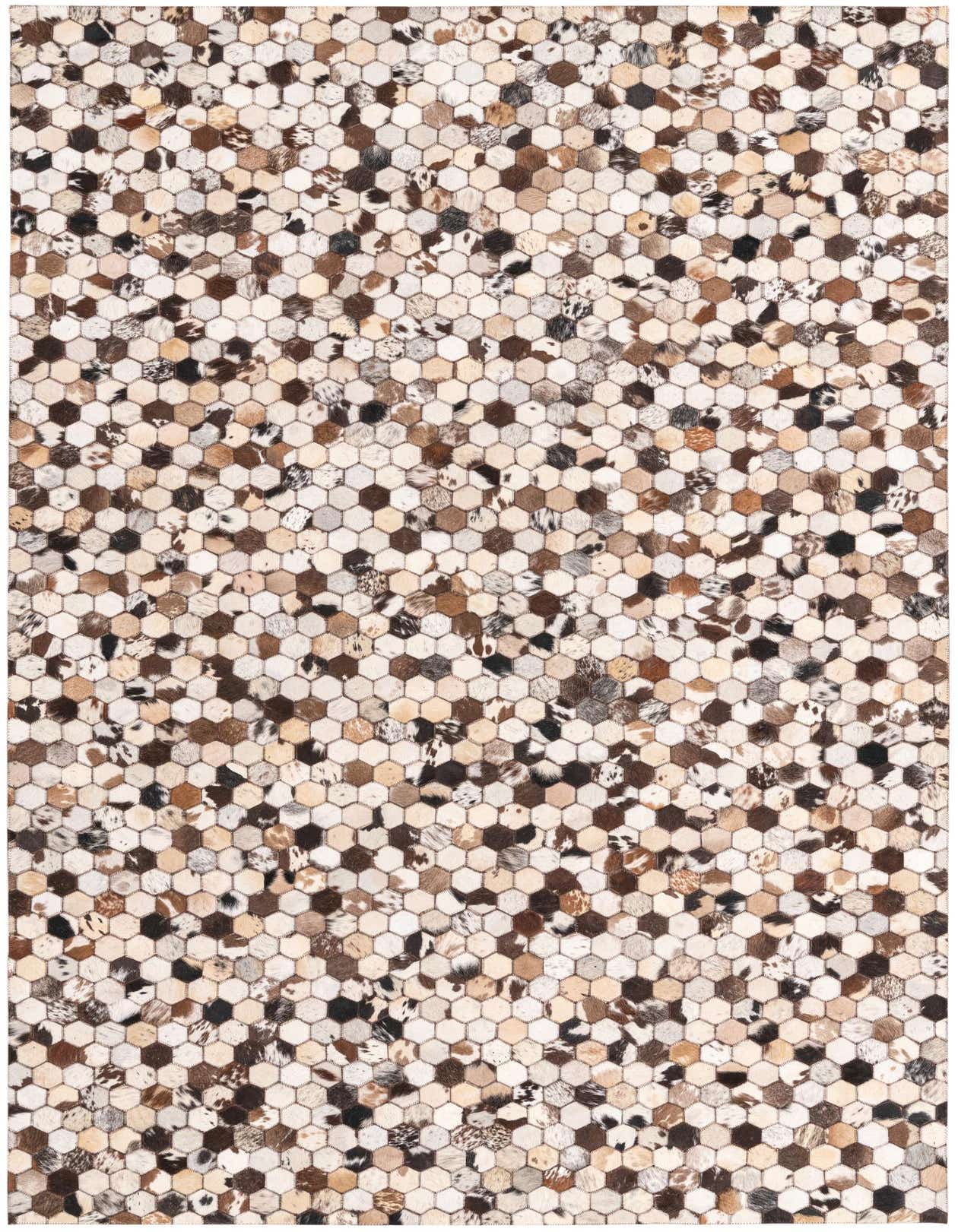A rectangular 5x8 modern cowhide rug with a multi-colored hexagonal patchwork pattern in shades of brown, black, and white.