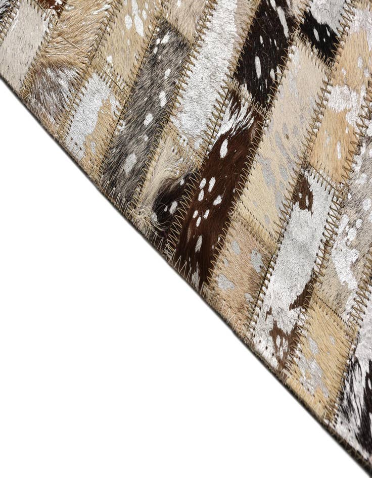 Detail image of  5' 4 x 7' 8 Cowhide Rug