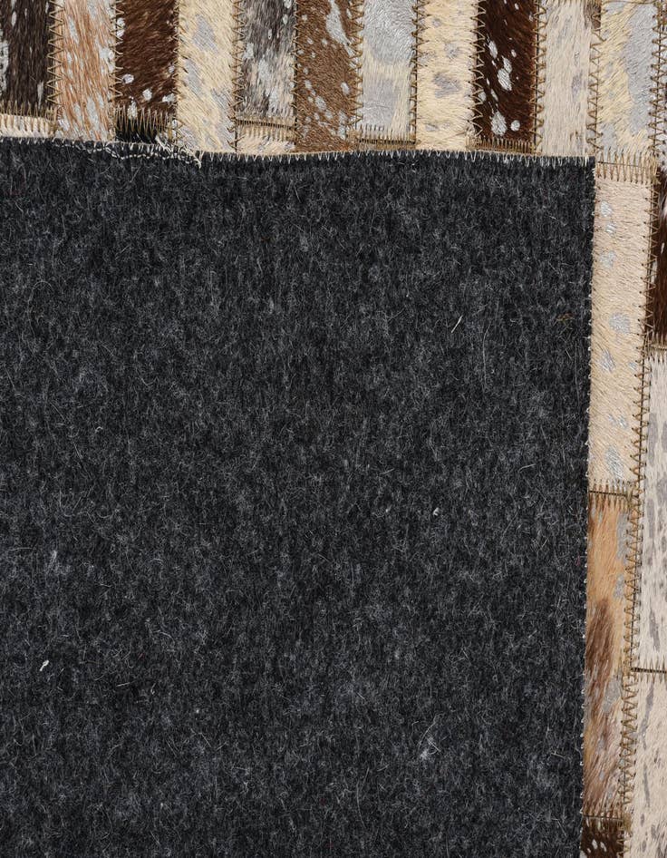 Detail image of  5' 4 x 7' 8 Cowhide Rug