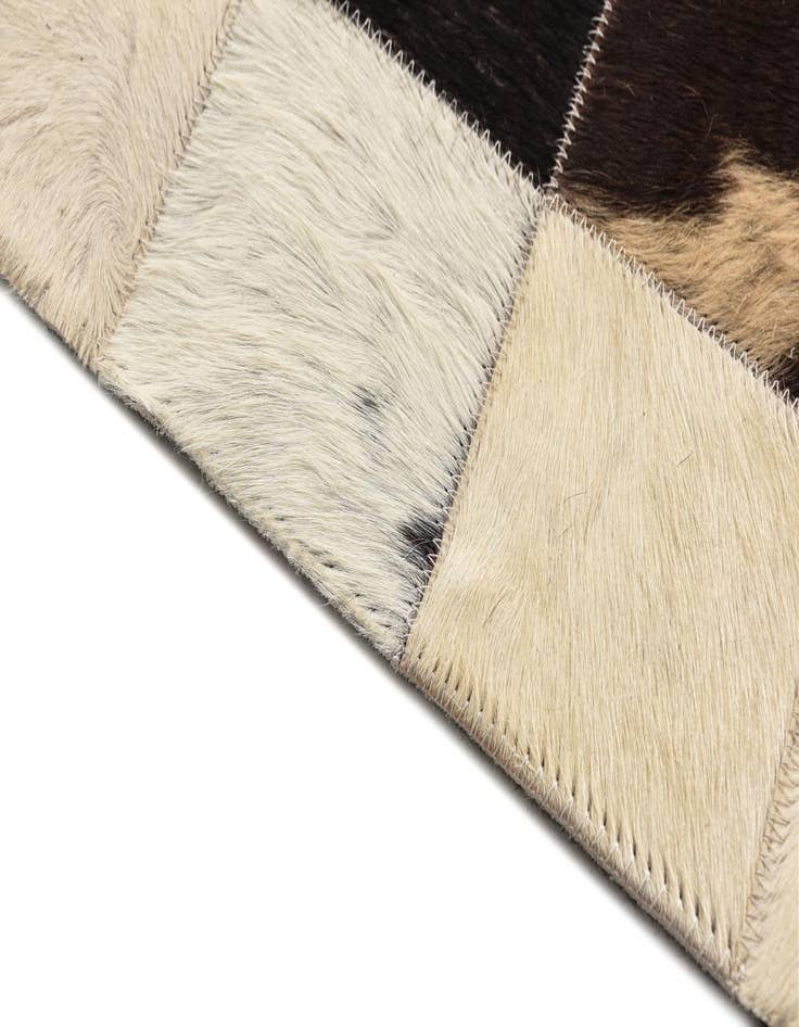Detail image of  5' 4 x 7' 8 Cowhide Rug