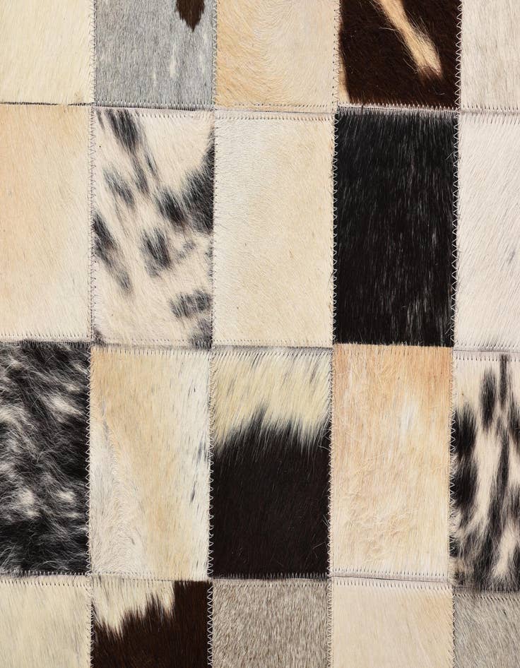 Detail image of  5' 4 x 7' 8 Cowhide Rug
