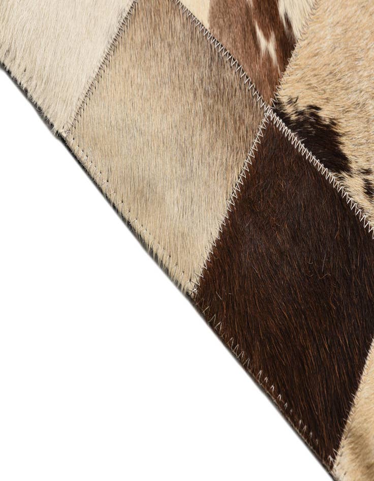 Detail image of  5' 4 x 7' 7 Cowhide Rug