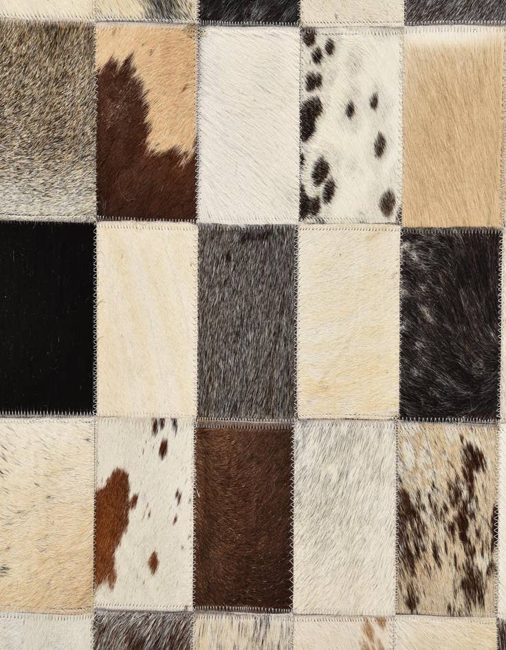 Detail image of  5' 4 x 7' 7 Cowhide Rug