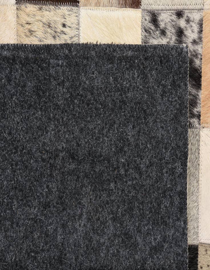 Detail image of  5' 4 x 7' 7 Cowhide Rug