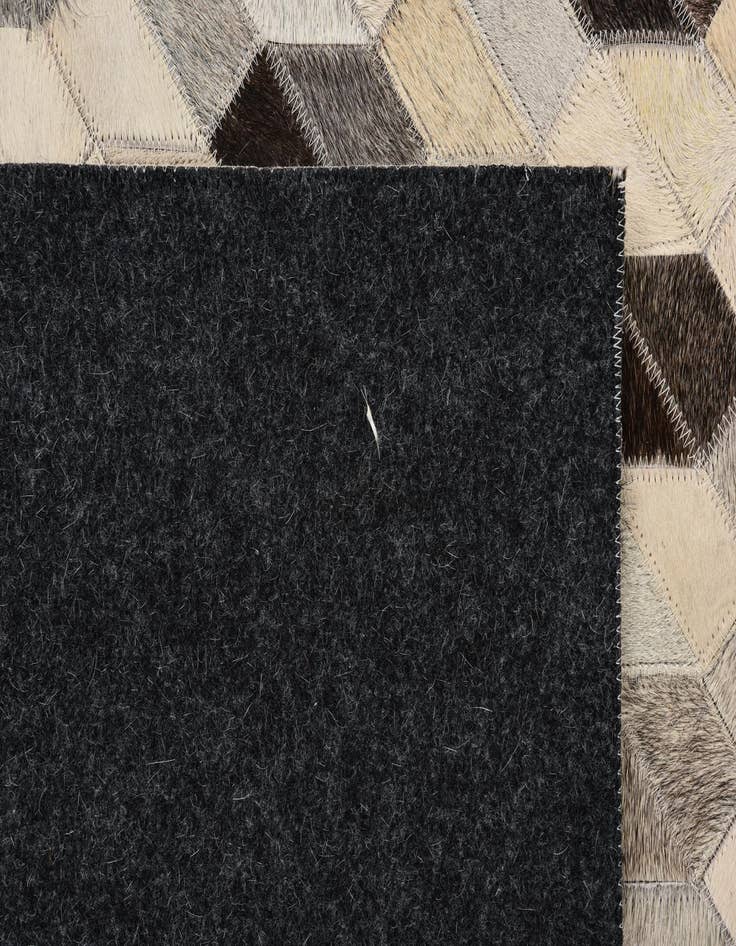 Detail image of  5' 2 x 7' 5 Cowhide Rug