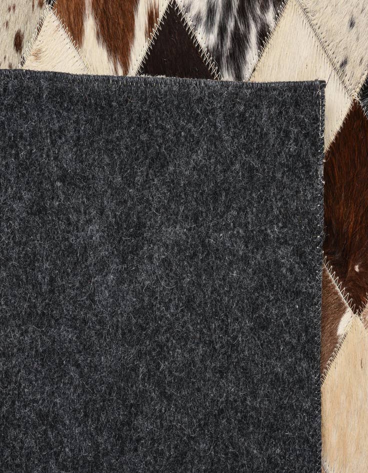 Detail image of  5' 4 x 7' 6 Cowhide Rug