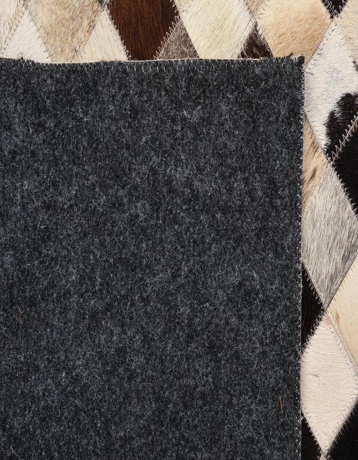 Detail image of  5' 5 x 7' 7 Cowhide Rug