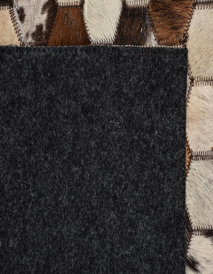Detail image of  5' 3 x 8' 1 Cowhide Rug