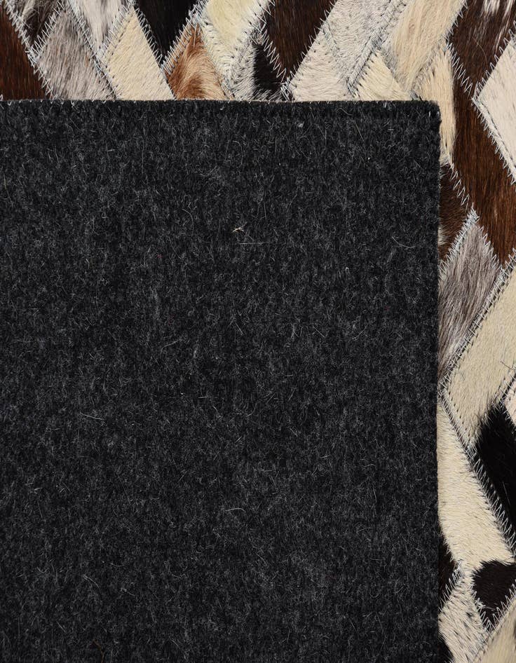 Detail image of  5' 2 x 7' Cowhide Rug