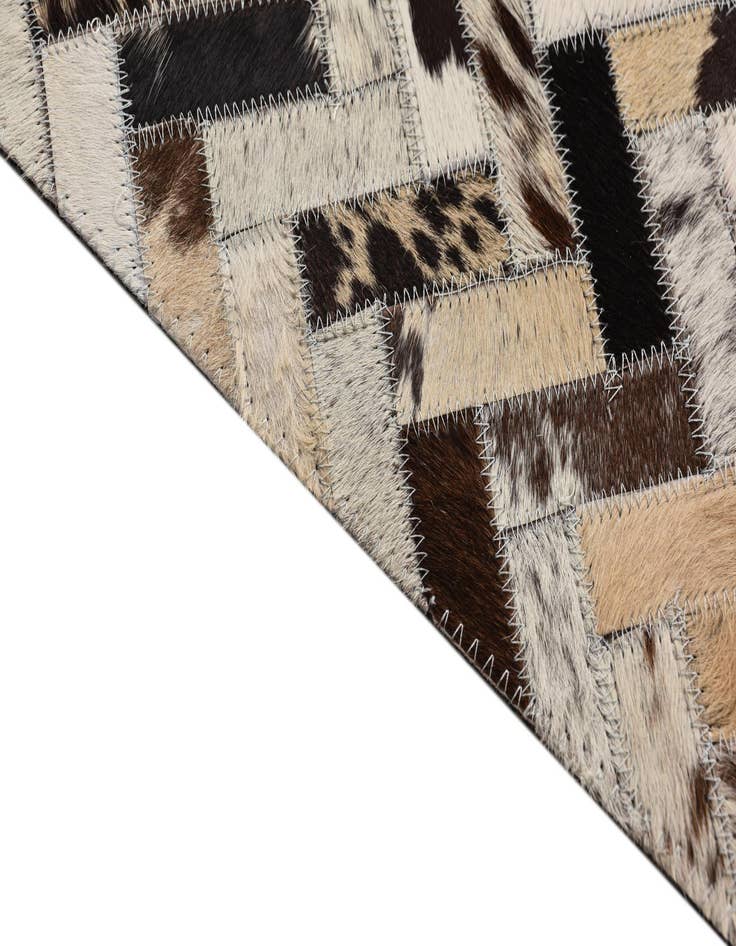 Detail image of  5' 1 x 8' 1 Cowhide Rug