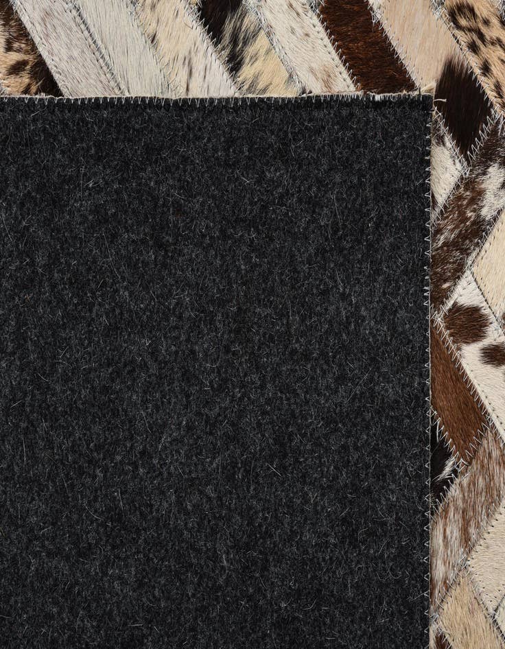 Detail image of  5' 1 x 8' 1 Cowhide Rug