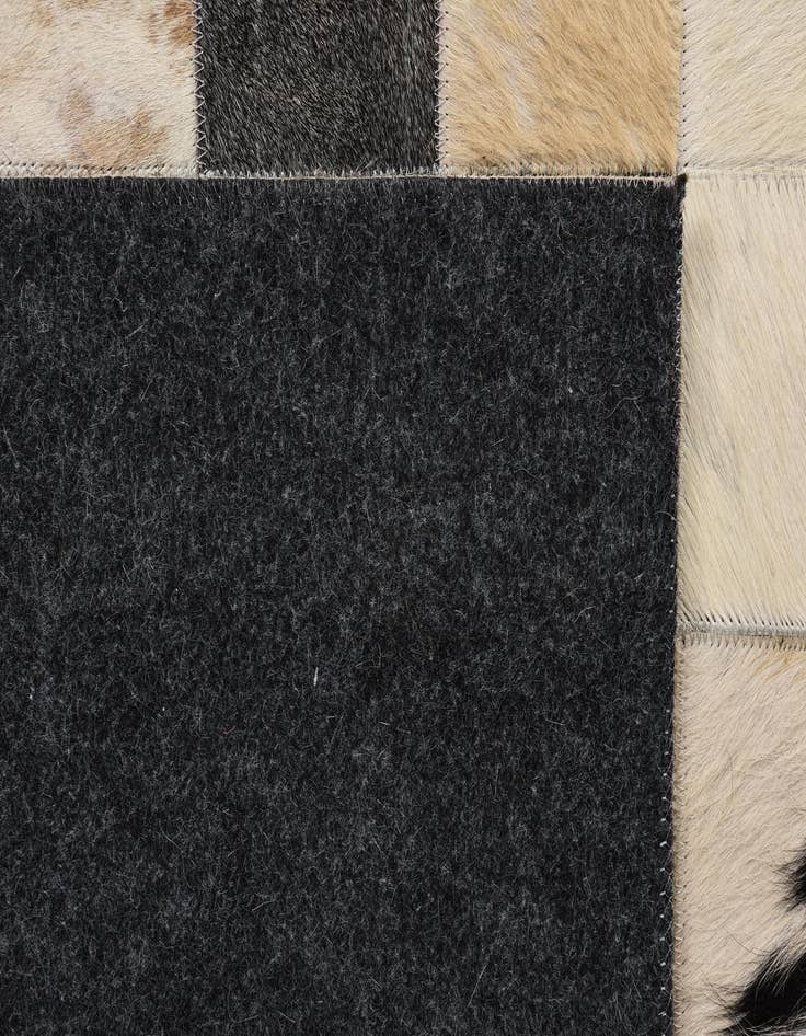 Detail image of  5' 4 x 7' 8 Cowhide Rug