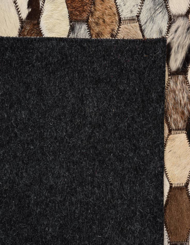 Detail image of  5' 2 x 8' 2 Cowhide Rug