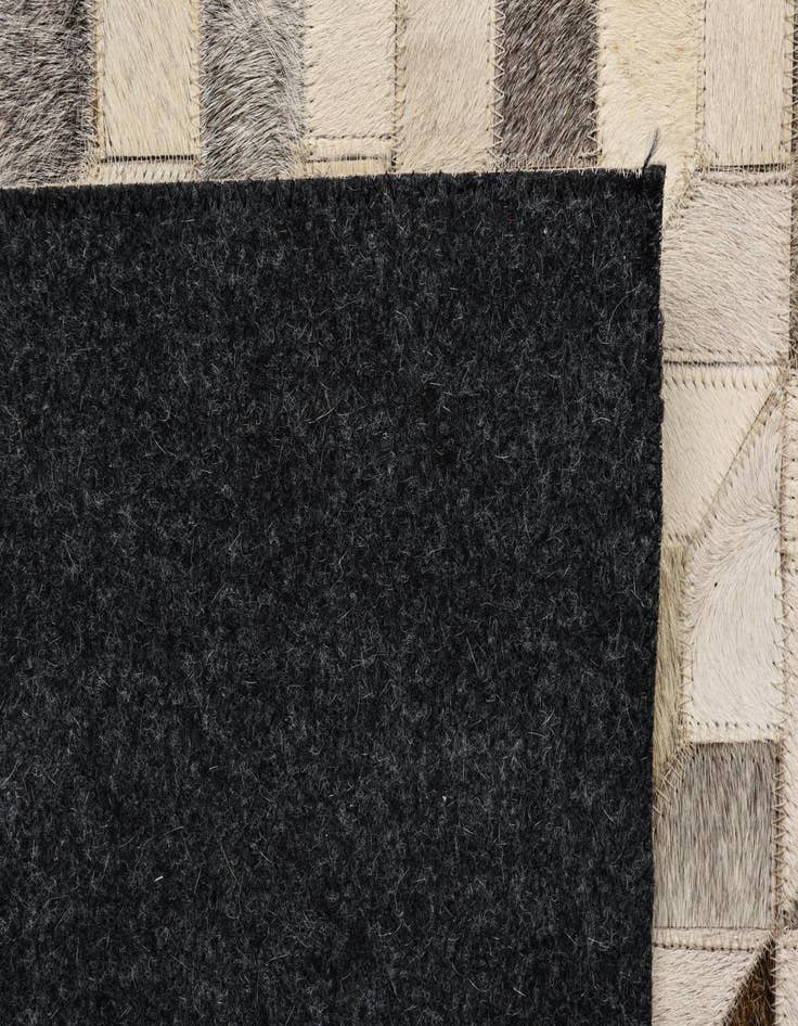 Detail image of  5' 4 x 7' 7 Cowhide Rug