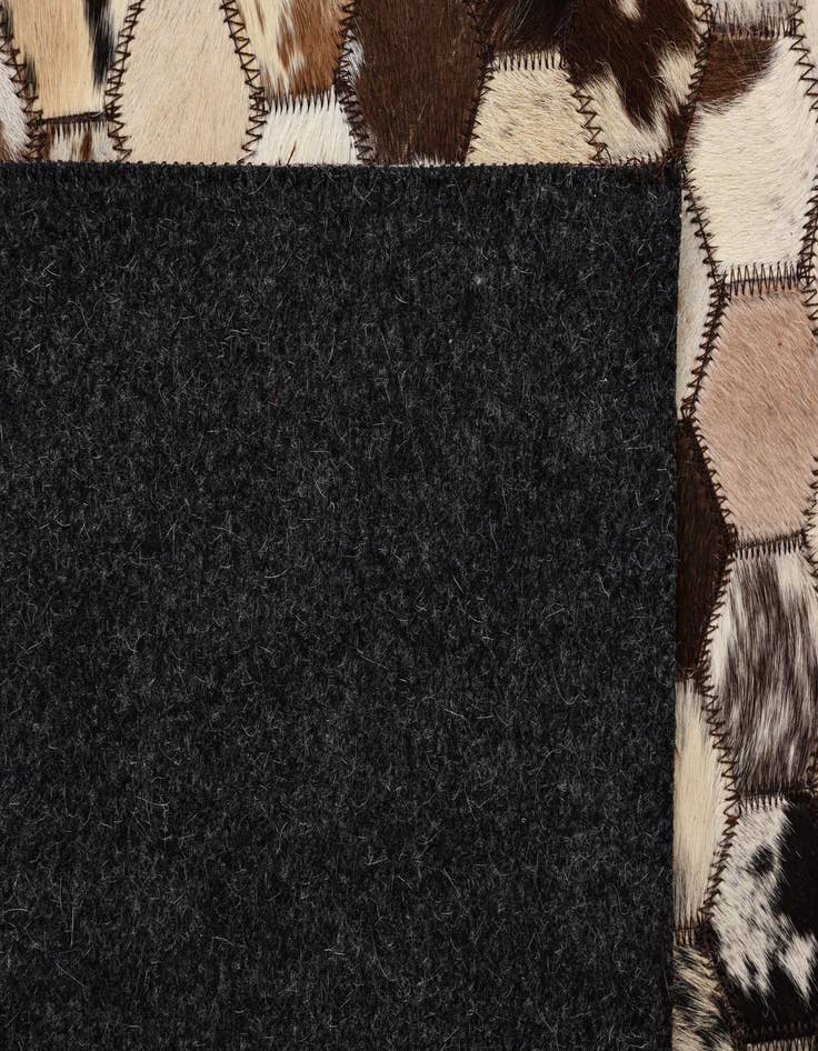 Detail image of  5' 1 x 8' 2 Cowhide Rug