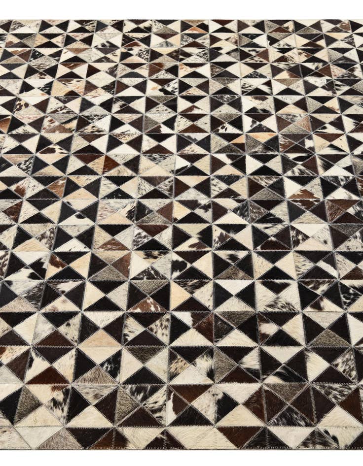 Detail image of  5' 4 x 7' 7 Cowhide Rug