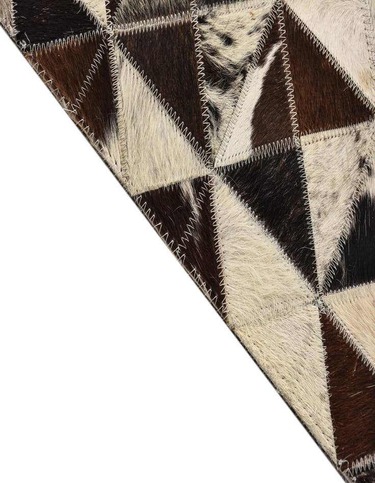 Detail image of  5' 4 x 7' 7 Cowhide Rug