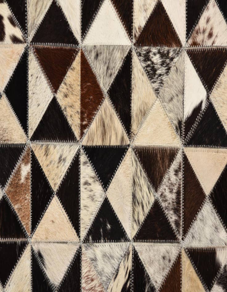 Detail image of  5' 4 x 7' 7 Cowhide Rug