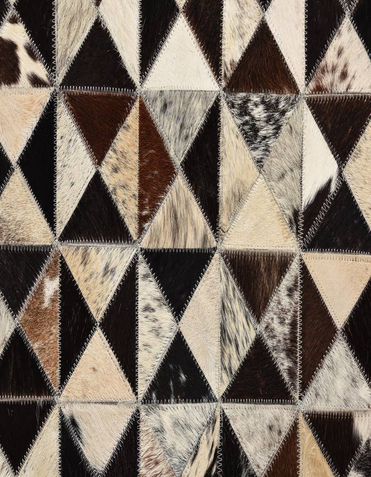 Detail image of  5' 4 x 7' 7 Cowhide Rug