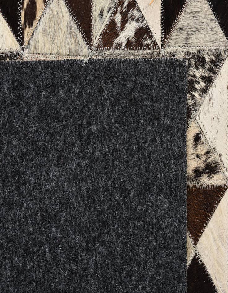 Detail image of  5' 4 x 7' 7 Cowhide Rug