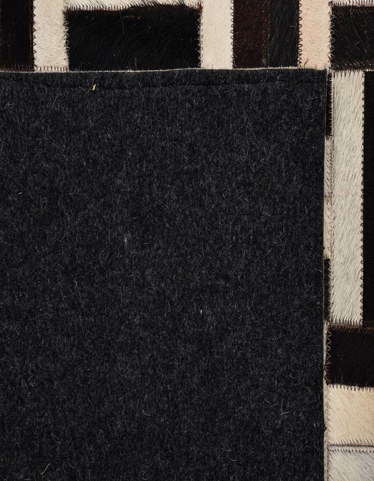 Detail image of  5' 4 x 8' 2 Cowhide Rug