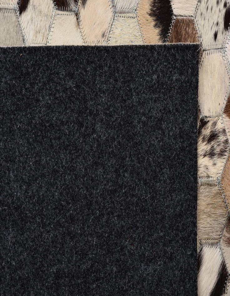 Detail image of  5' 1 x 7' 10 Cowhide Rug