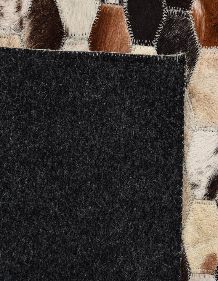 Detail image of  5' 2 x 8' 2 Cowhide Rug