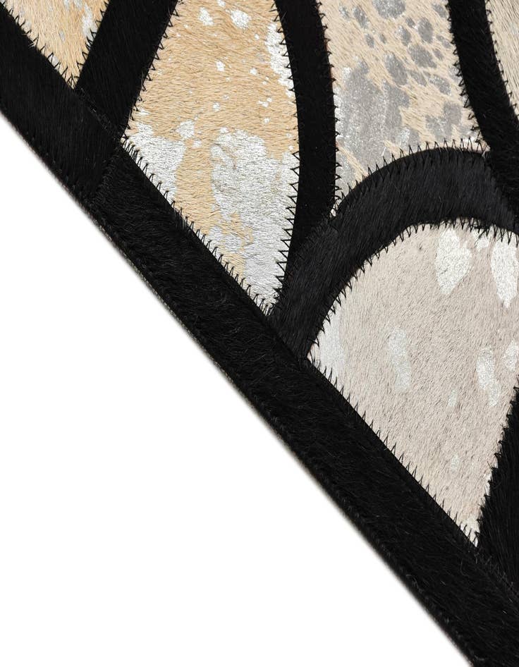 Detail image of  5' 3 x 7' 7 Cowhide Rug