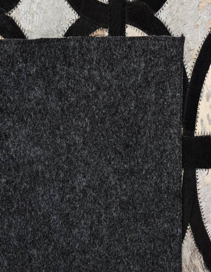 Detail image of  5' 3 x 7' 7 Cowhide Rug