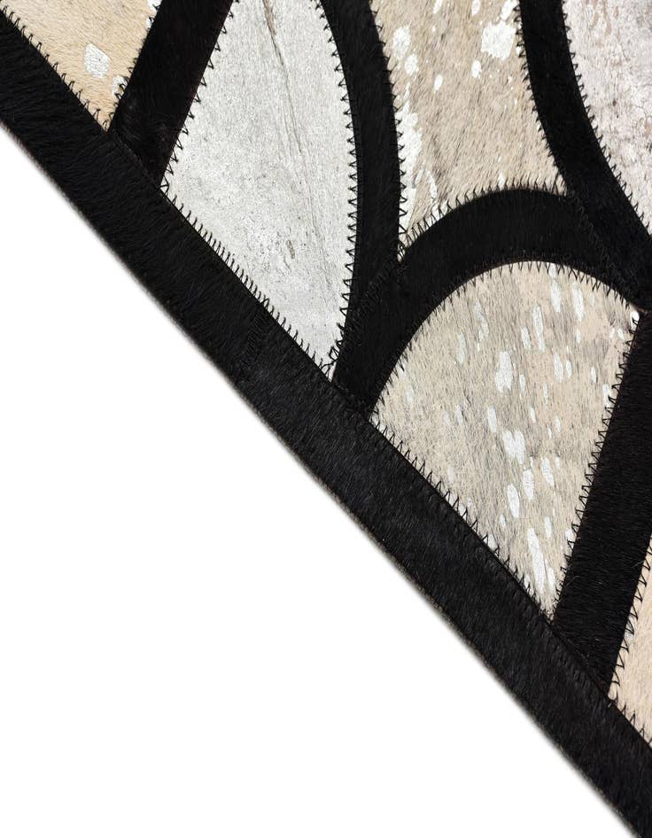 Detail image of  5' 3 x 7' 8 Cowhide Rug