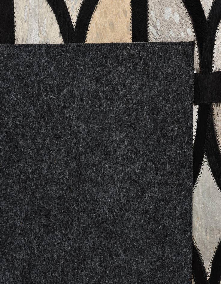 Detail image of  5' 2 x 7' 6 Cowhide Rug