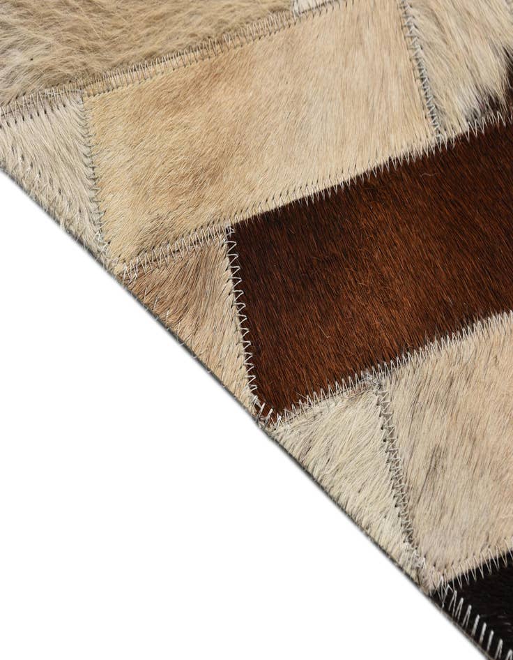Detail image of  5' 3 x 7' 8 Cowhide Rug