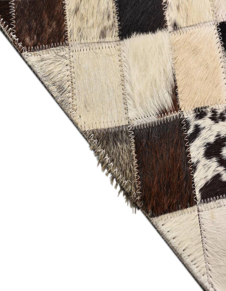 Detail image of  5' 4 x 7' 8 Cowhide Rug