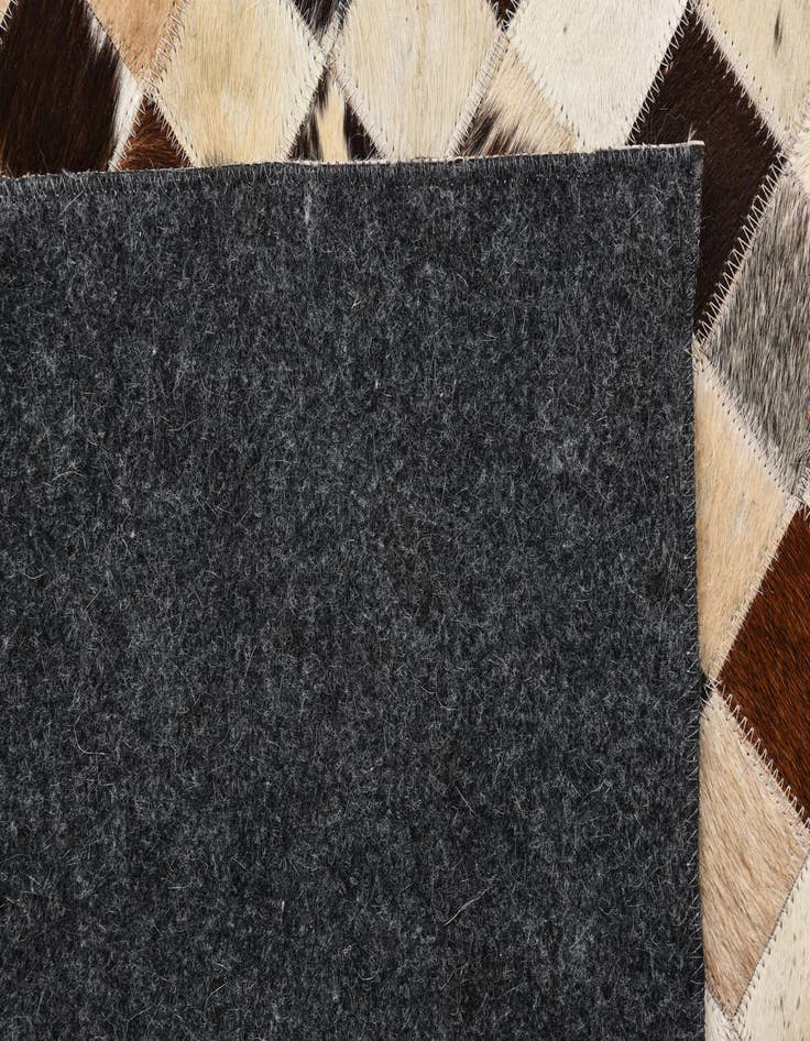 Detail image of  5' 4 x 7' 8 Cowhide Rug