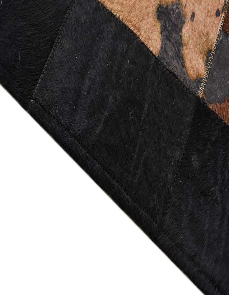Detail image of  5' 1 x 7' 6 Cowhide Rug