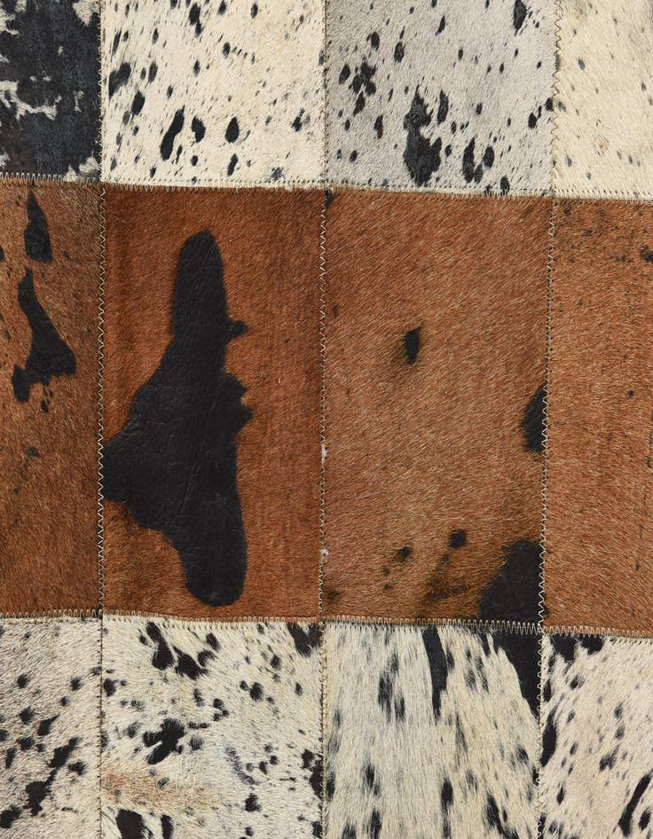 Detail image of  5' 1 x 7' 6 Cowhide Rug