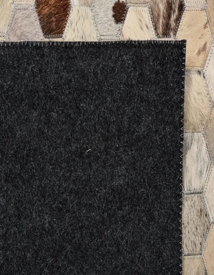 Detail image of  4' 9 x 8' Cowhide Rug