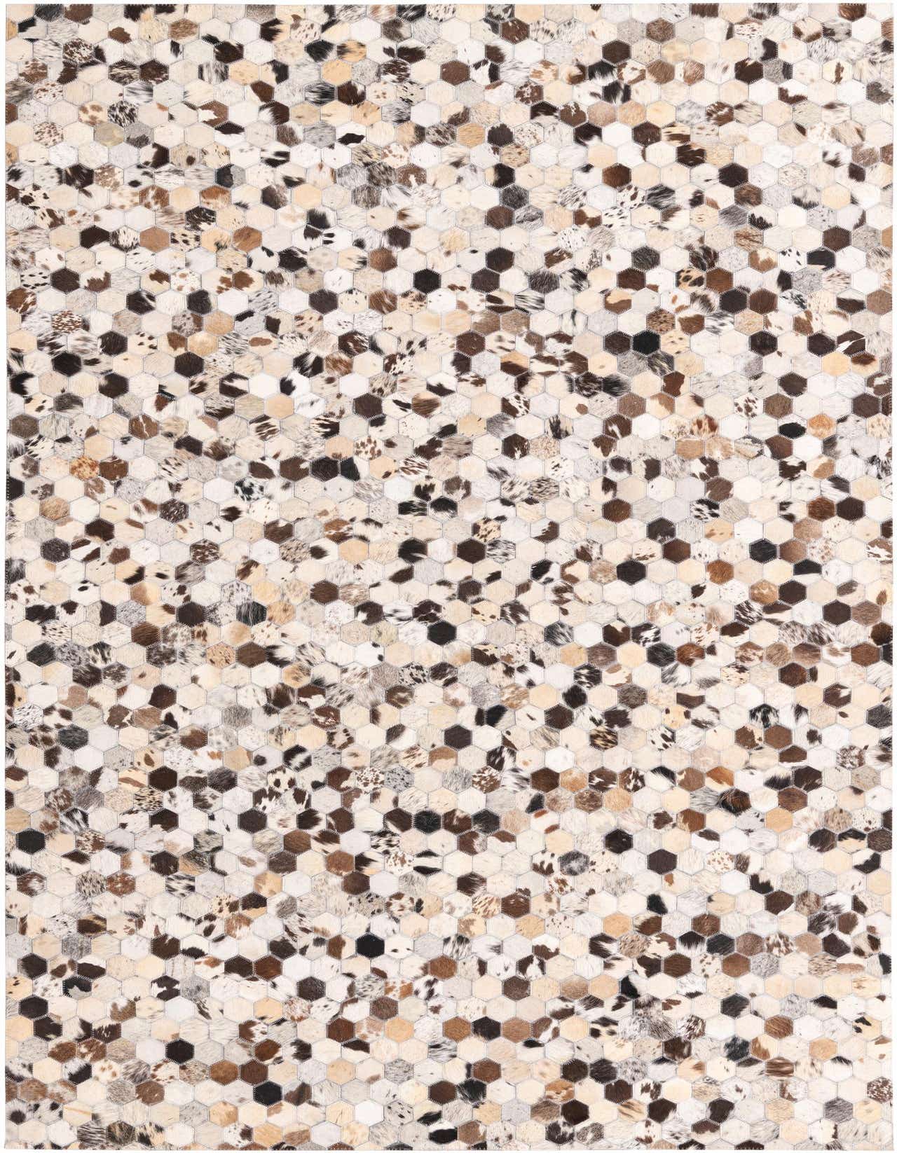 A rectangular 5x8 modern cowhide rug featuring a mosaic of multi-colored hexagonal patches in natural brown, black, and white tones.