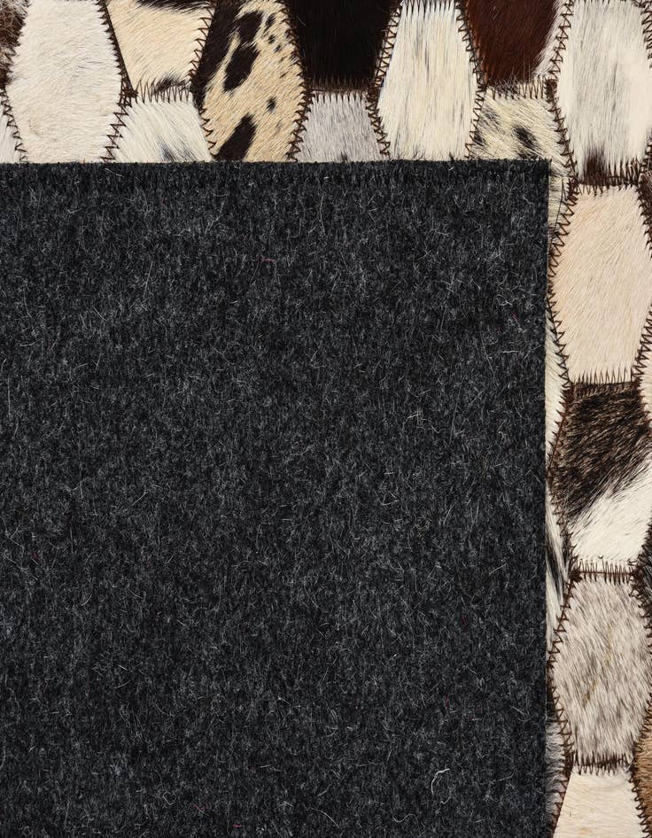 Detail image of  5' 1 x 8' 1 Cowhide Rug