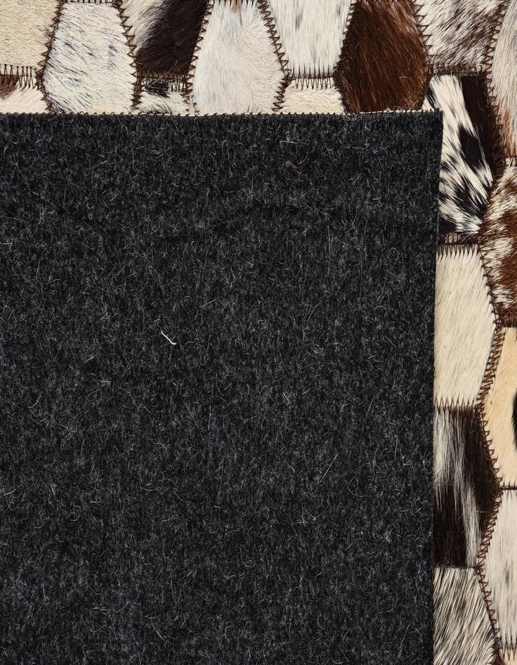 Detail image of  5' 2 x 8' 2 Cowhide Rug