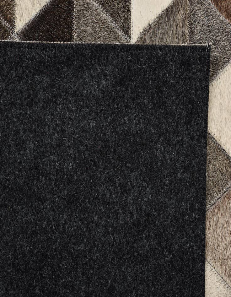 Detail image of  5' 1 x 7' 5 Cowhide Rug