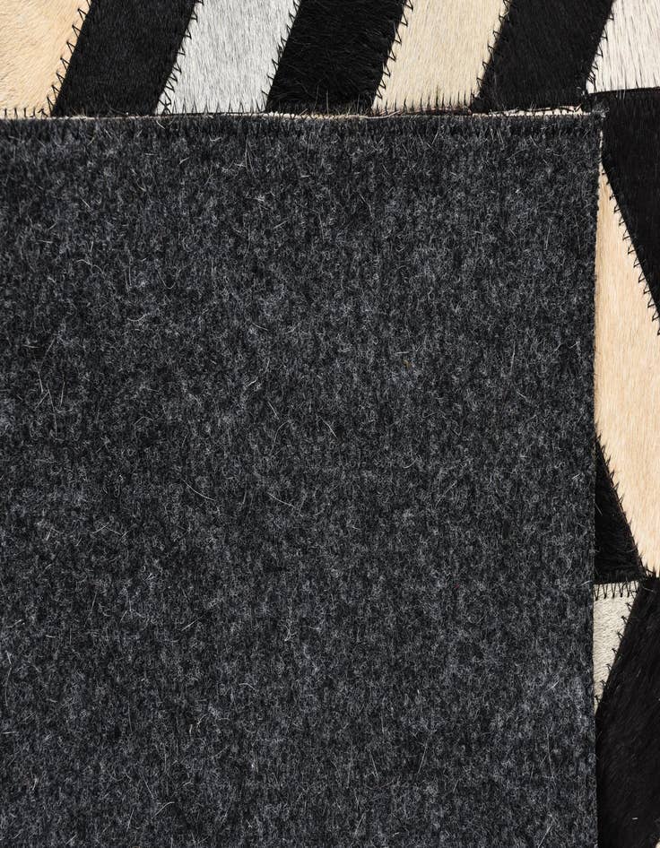 Detail image of  5' 3 x 8' Cowhide Rug